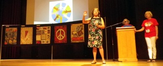 Joyce Fairchild presenting the Tapestry for Peace.