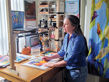 Christine Landis teaches an art class via Zoom