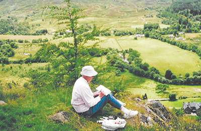 Artist working outdoors