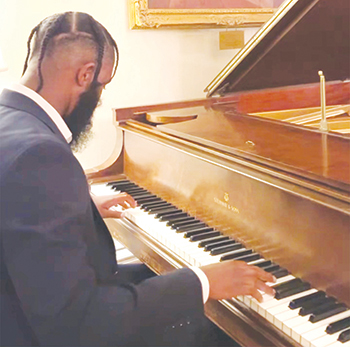 Pianist performs jazz at Pen Arts. 