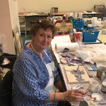 artist working on collage