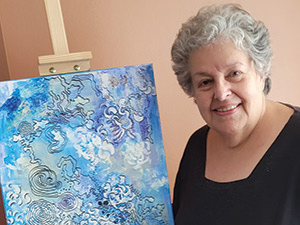 artist with painting