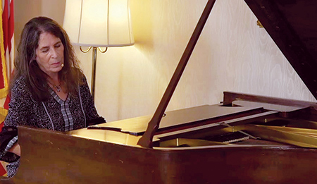 Mary Fineman performs at the Biennial at Pen Arts.
